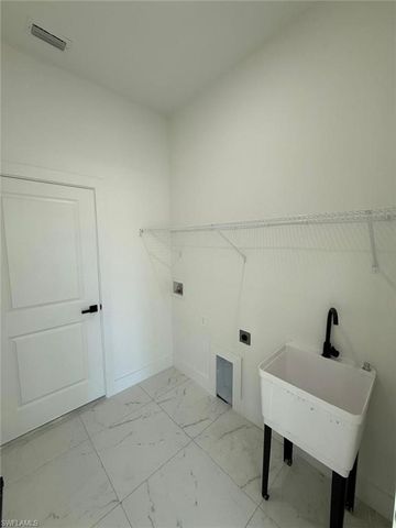 1121 Florence ST E, Lehigh Acres, FL 33974