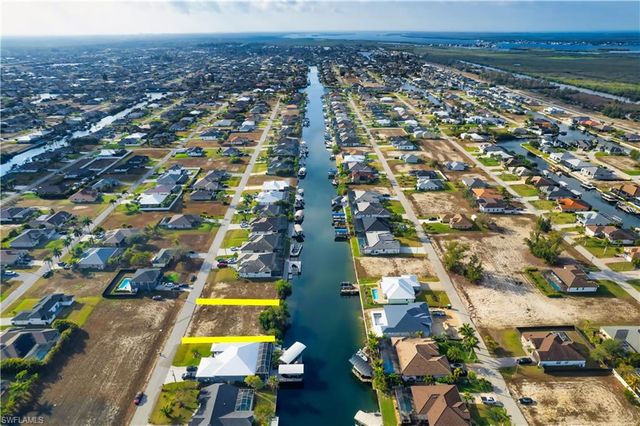 718 NW 37th PL, Cape Coral, FL 33993