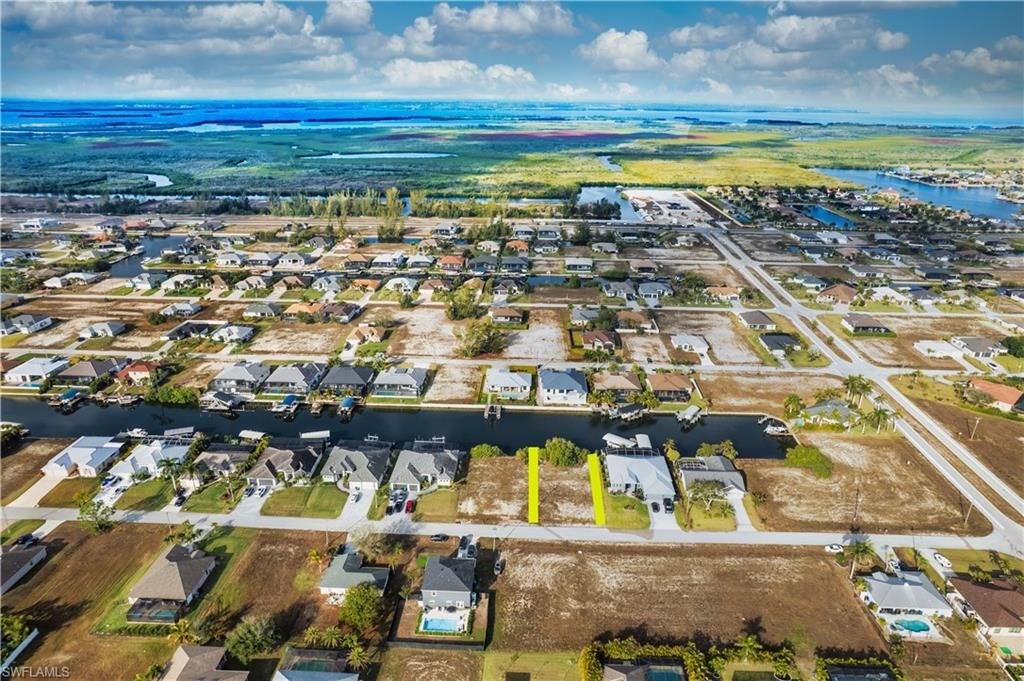 Image 2 of property listing at 718 NW 37th PL, Cape Coral, FL 33993