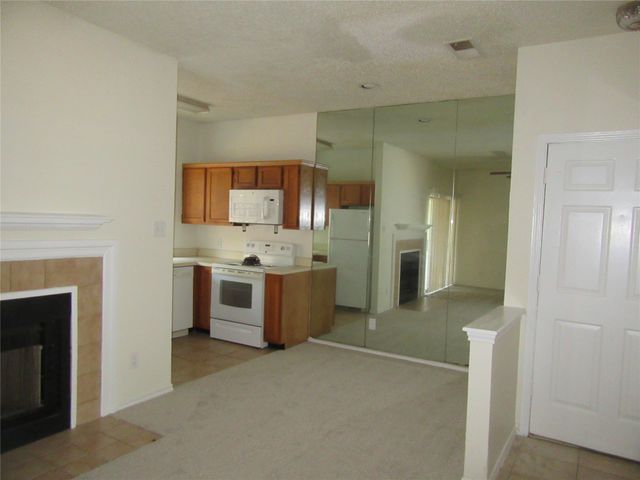 9737 Whitehurst Drive 31, Dallas, TX 75243