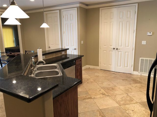 7039 Kingston Cove Lane 207, Willis, TX 77318