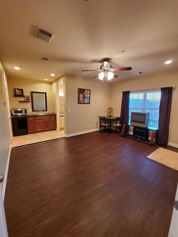 7039 Kingston Cove Lane 207, Willis, TX 77318