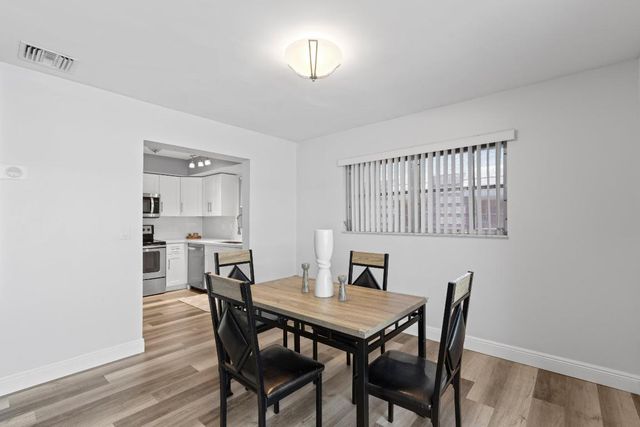 419 Pine Tree Court 21, Atlantis, FL 33462