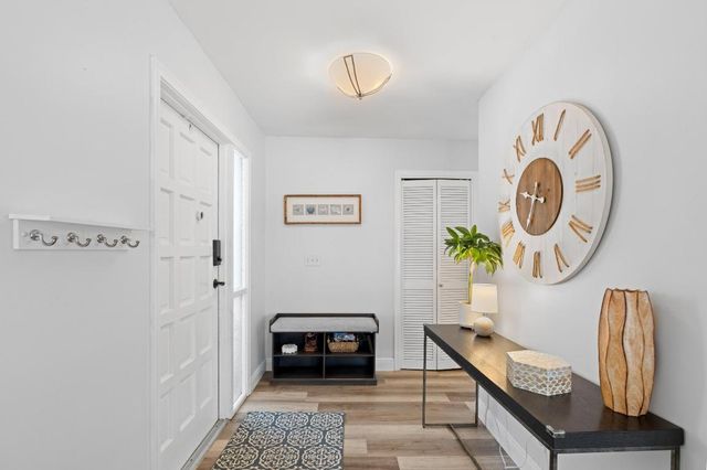 419 Pine Tree Court 21, Atlantis, FL 33462