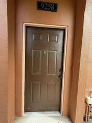 9258 LAKE CHASE ISLAND WAY, Tampa, FL 33626