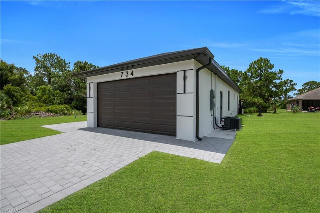 734 Theodore Vail ST E, LEHIGH ACRES, FL 33974 — photo 4