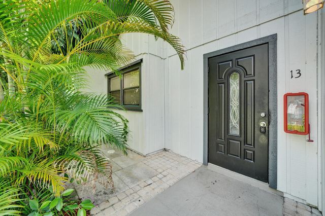 100 Sparrow Drive 13, Royal Palm Beach, FL 33411