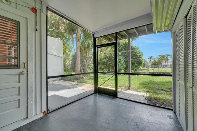 100 Sparrow Drive 13, Royal Palm Beach, FL 33411
