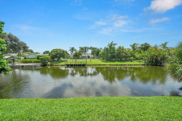 100 Sparrow Drive 13, Royal Palm Beach, FL 33411