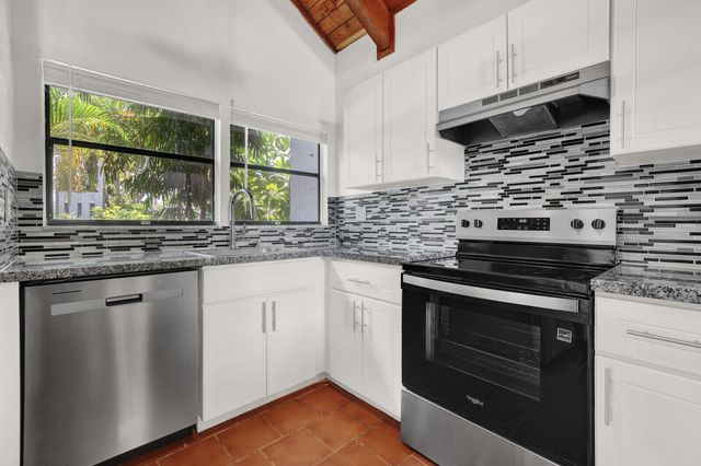 100 Sparrow Drive 13, Royal Palm Beach, FL 33411