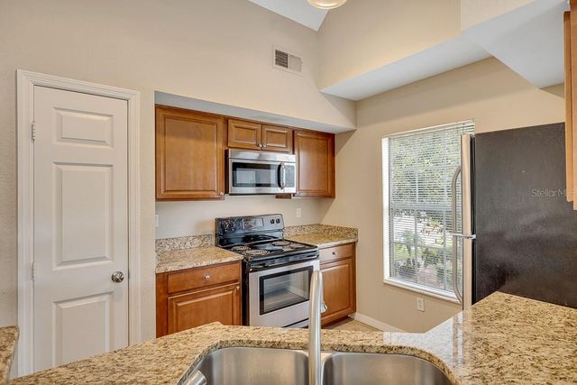 9414 LAKE CHASE ISLAND WAY 9414, Tampa, FL 33626