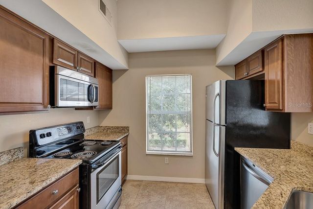 9414 LAKE CHASE ISLAND WAY 9414, Tampa, FL 33626