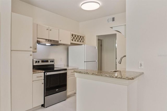 2558 ROBERT TRENT JONES DRIVE 1434, Orlando, FL 32835