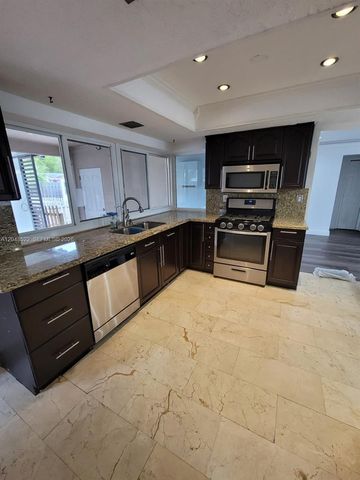 8461 NW 27th Pl, Sunrise, FL 33322