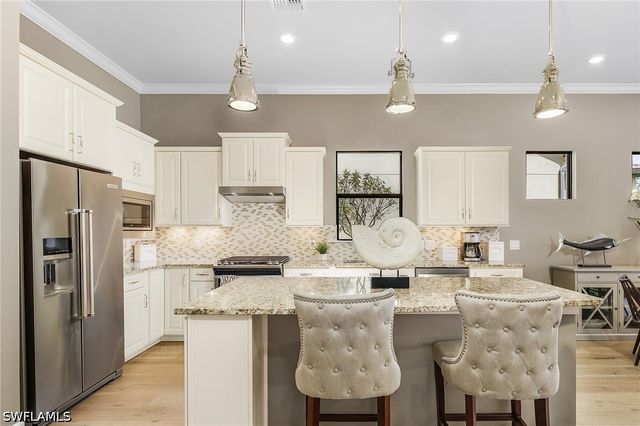 9248 Cormorant DR, Naples, FL 34120