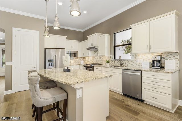 9248 Cormorant DR, Naples, FL 34120
