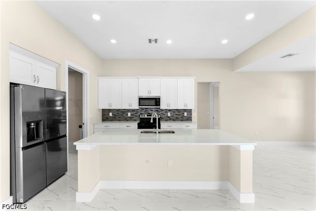 4100 8th ST SW, Lehigh Acres, FL 33976