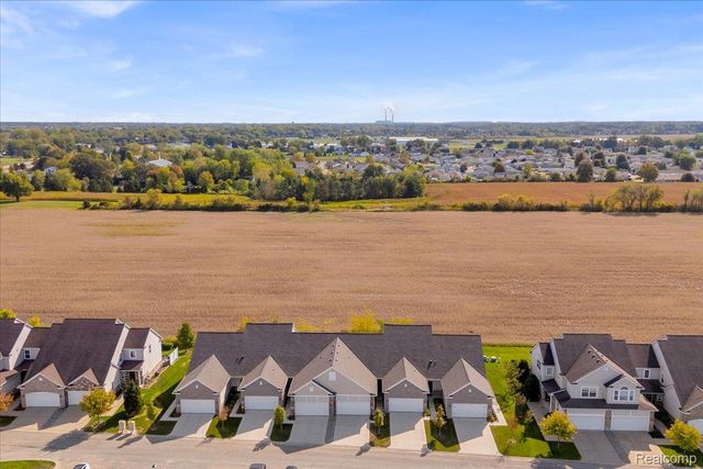 831 Plum Village Drive, Raisinville Township, MI 48161