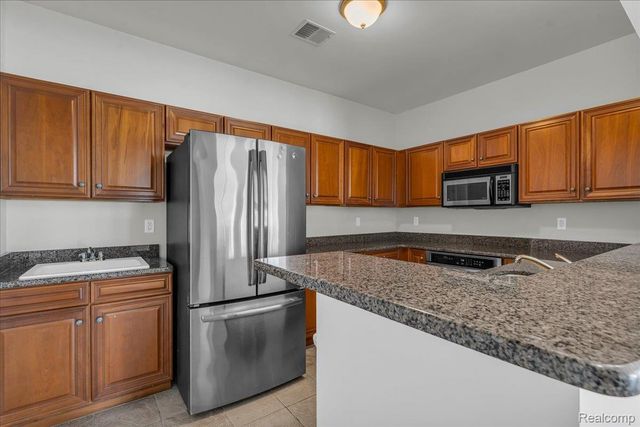 831 Plum Village Drive, Raisinville Township, MI 48161