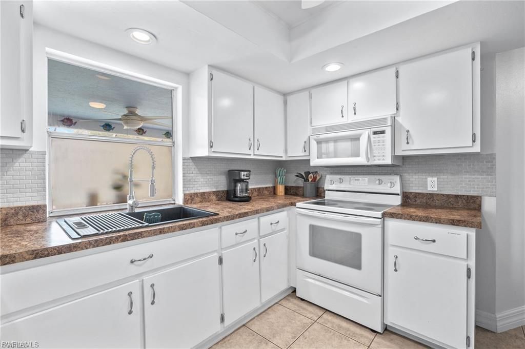 1015 SE 25th LN, CAPE CORAL, FL 33904 — photo 4