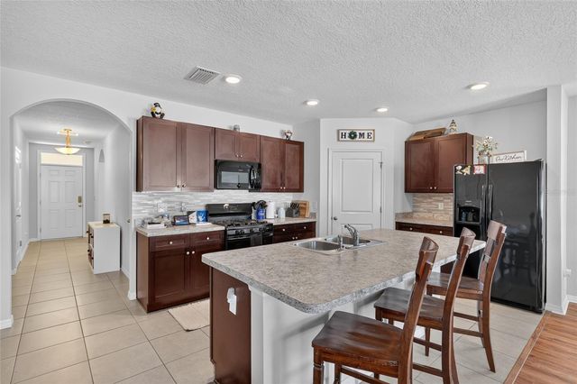 9785 PEPPER TREE TRAIL, Wildwood, FL 34785
