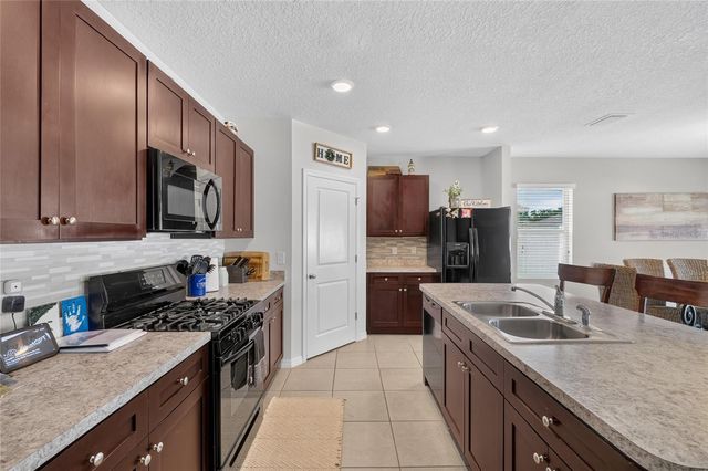 9785 PEPPER TREE TRAIL, Wildwood, FL 34785