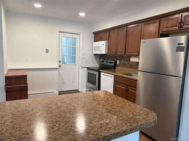 226 Woodycrest Drive, Holtsville, NY 11742