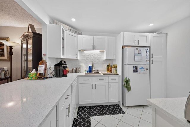 3251 HOLIDAY SPRINGS Boulevard 205, Margate, FL 33063