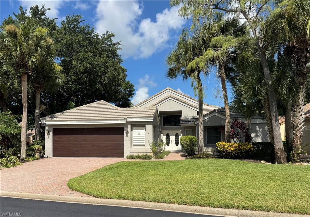 54 Grey Wing PT, Naples, FL 34113