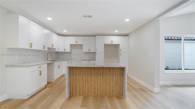 9661 NW 44th Court, Sunrise, FL 33351