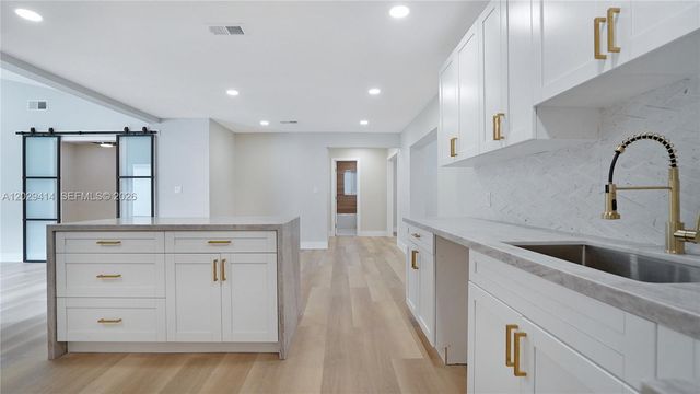 9661 NW 44th Court, Sunrise, FL 33351