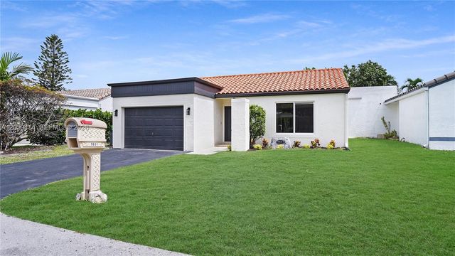 9661 NW 44th Court, Sunrise, FL 33351