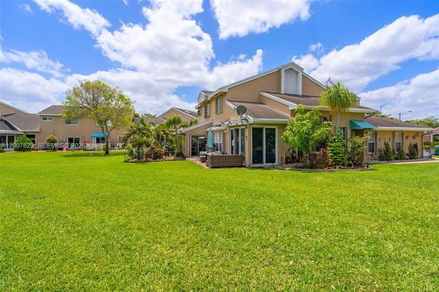 7059 Woodmont Way, Tamarac, FL 33321