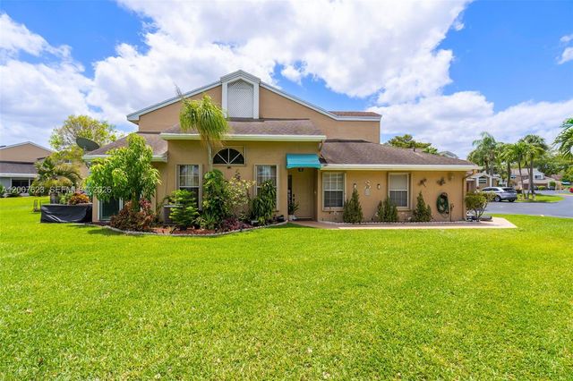7059 Woodmont Way, Tamarac, FL 33321