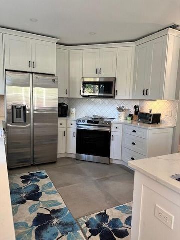 1143 Duncan Circle 104, Palm Beach Gardens, FL 33418