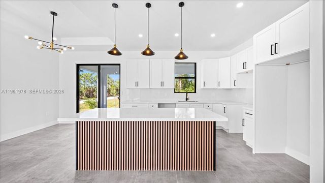 4127 NW 36th PL, Cape Coral, FL 33993