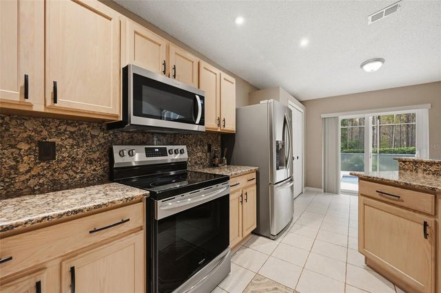 239 CHINA BERRY CIRCLE, Davenport, FL 33837