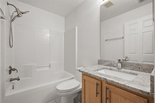 239 CHINA BERRY CIRCLE, Davenport, FL 33837