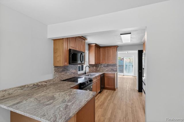 677 Lucille Drive, Wolverine Lake, MI 48390