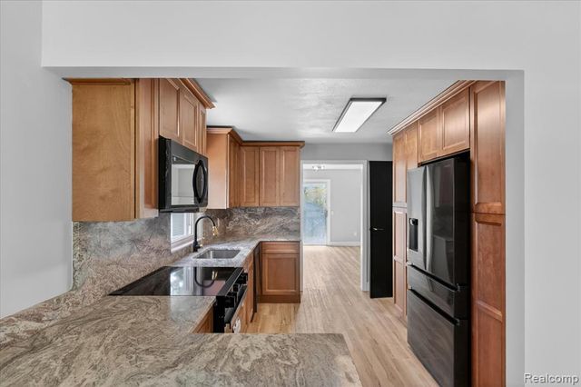 677 Lucille Drive, Wolverine Lake, MI 48390