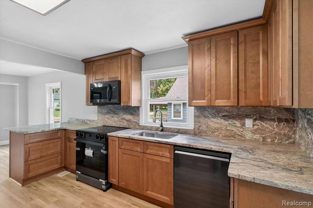 677 Lucille Drive, Wolverine Lake, MI 48390
