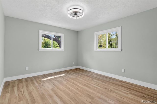 677 Lucille Drive, Wolverine Lake, MI 48390