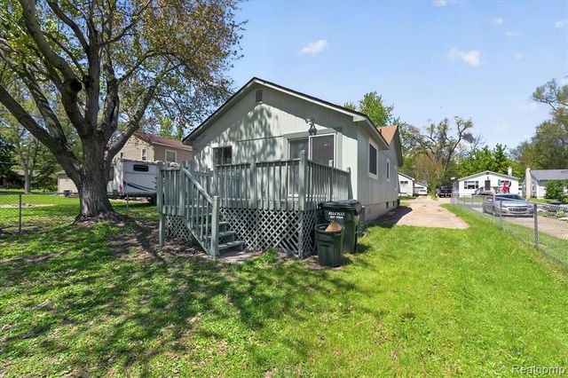 677 Lucille Drive, Wolverine Lake, MI 48390