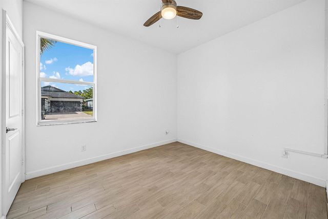 19779 Rugged Trunk Trail, The Acreage, FL 33470