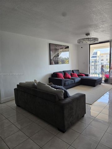 6195 Rock Island Road 409, Tamarac, FL 33319