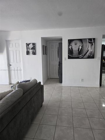 6195 Rock Island Road 409, Tamarac, FL 33319