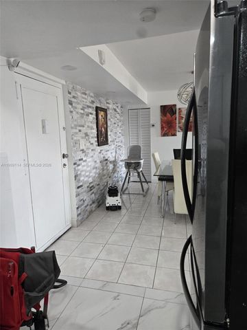 6195 Rock Island Road 409, Tamarac, FL 33319