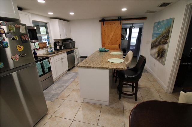 5802 GREENWOOD WAY, Holiday, FL 34690