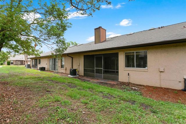 5807 RED DAHLIA COURT 27, Orlando, FL 32807