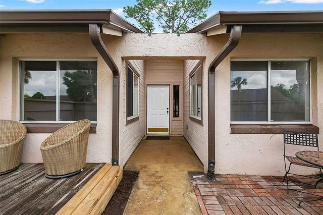 5807 RED DAHLIA COURT 27, Orlando, FL 32807